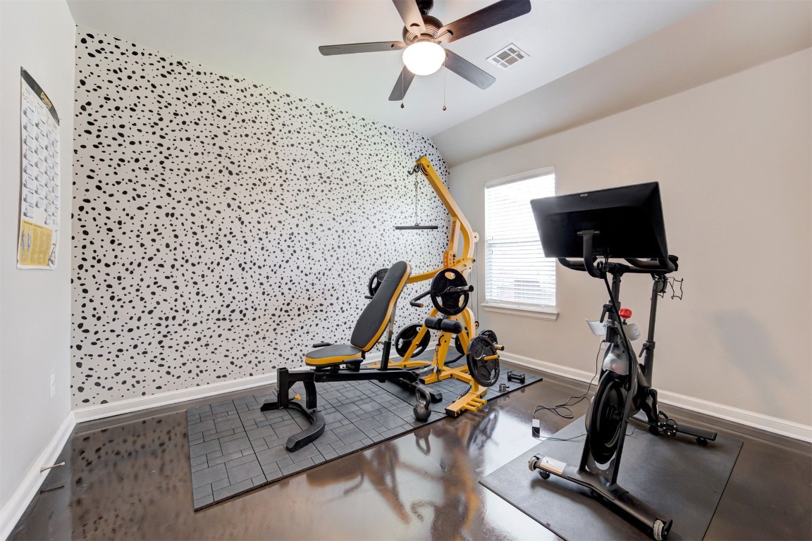 6233 Beverly Hills Drive, Edmond, OK 73034 exercise room with ceiling fan