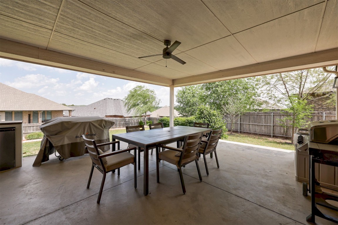 6233 Beverly Hills Drive, Edmond, OK 73034 view of patio / terrace featuring a grill and ceiling fan