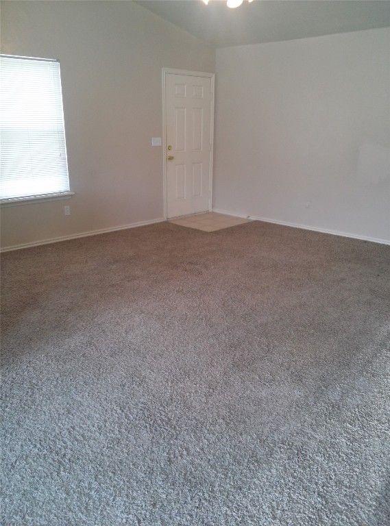 Address Hidden view of carpeted spare room