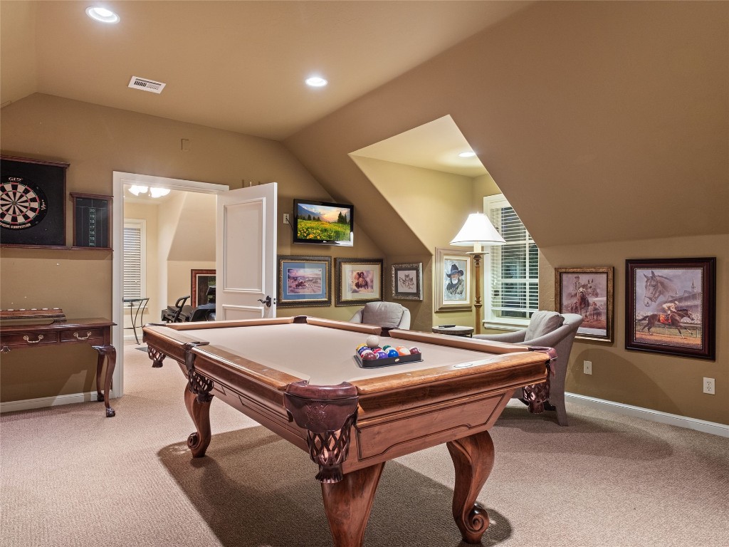 5300 Carrington Place, Oklahoma City, OK 73131 recreation room featuring vaulted ceiling, carpet flooring, and pool table