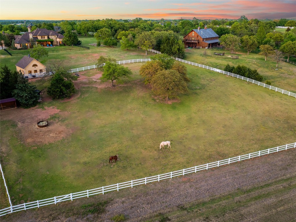 5300 Carrington Place, Oklahoma City, OK 73131 aerial view at dusk with a rural view