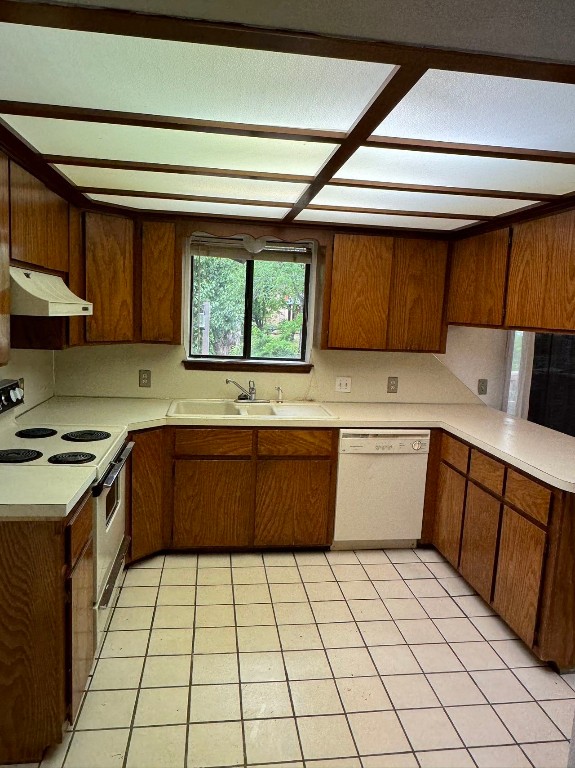 1810 Remington Circle, Shawnee, OK 74801 kitchen featuring sink, white appliances, and light tile floors