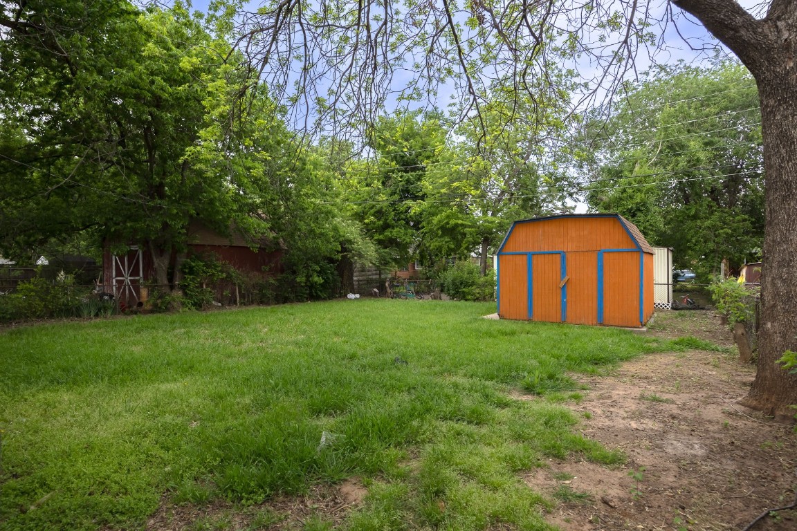 3001 W Hill Street, Oklahoma City, OK 73112 view of yard with a storage shed