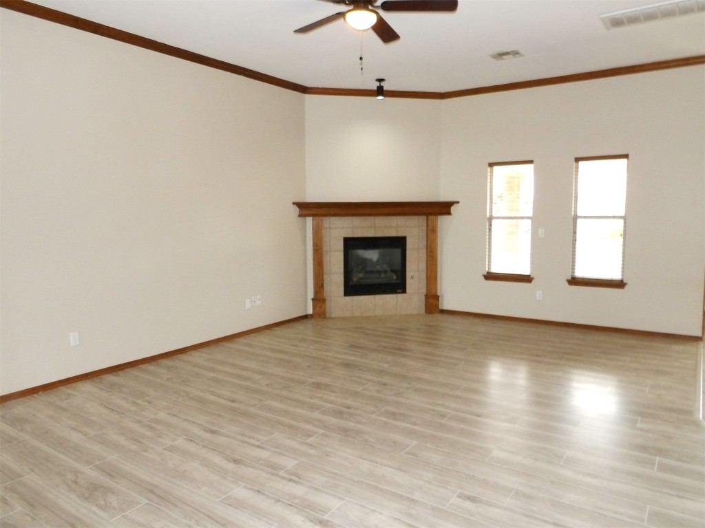 2424 Stonebridge Drive, Norman, OK 73071 unfurnished room featuring light wood-type flooring