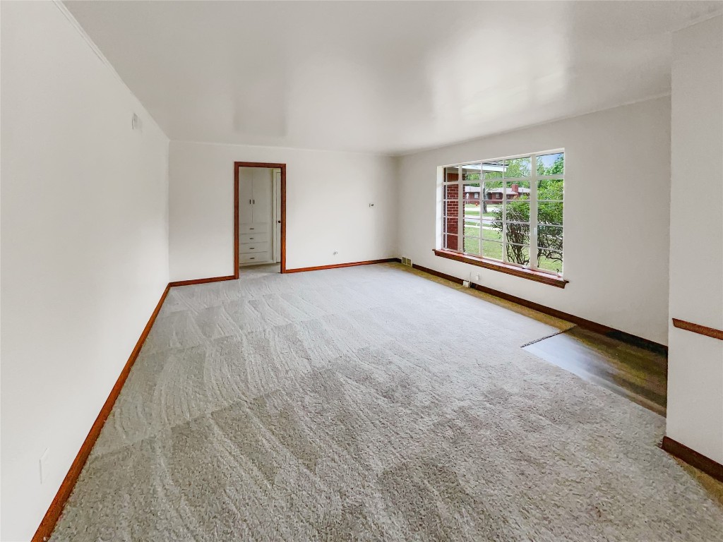 4440 NW 19th Street, Oklahoma City, OK 73107 unfurnished room with carpet flooring