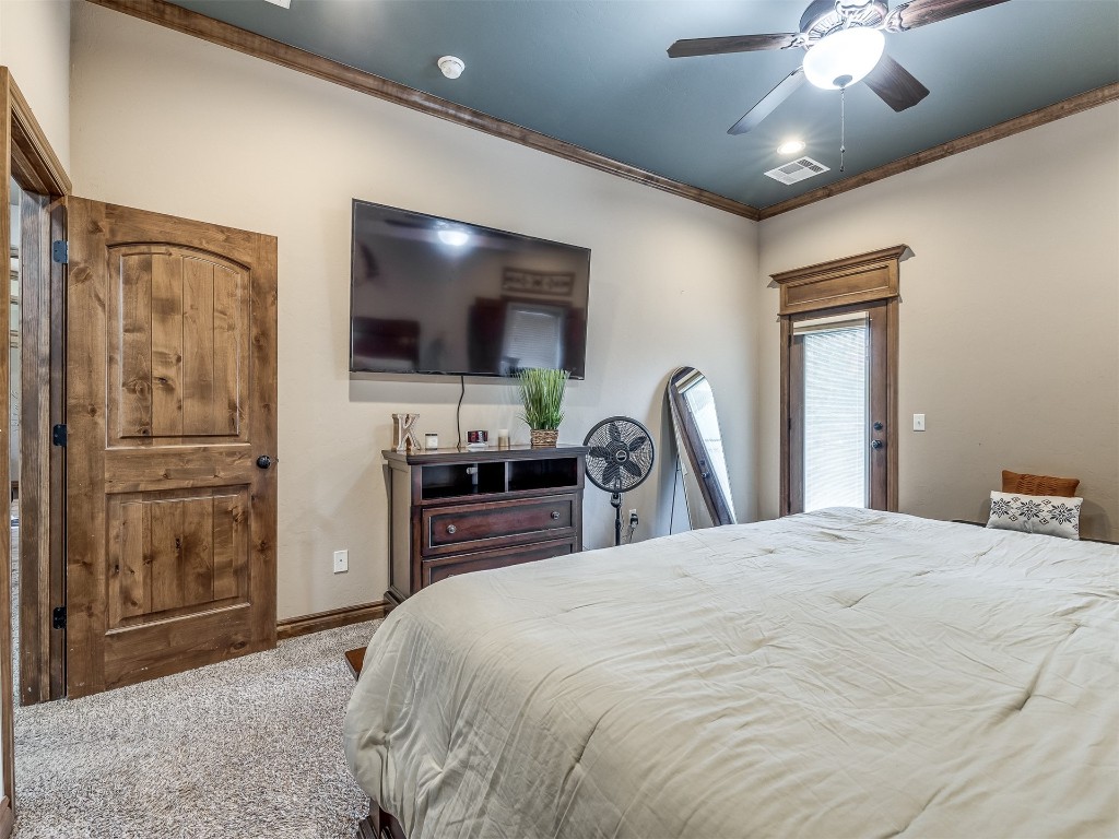 953 County Street 2982, Blanchard, OK 73010 bedroom featuring ceiling fan and carpet