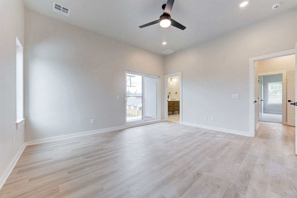 808 N Douglas Avenue, Oklahoma City, OK 73106 unfurnished room featuring light hardwood / wood-style floors and ceiling fan