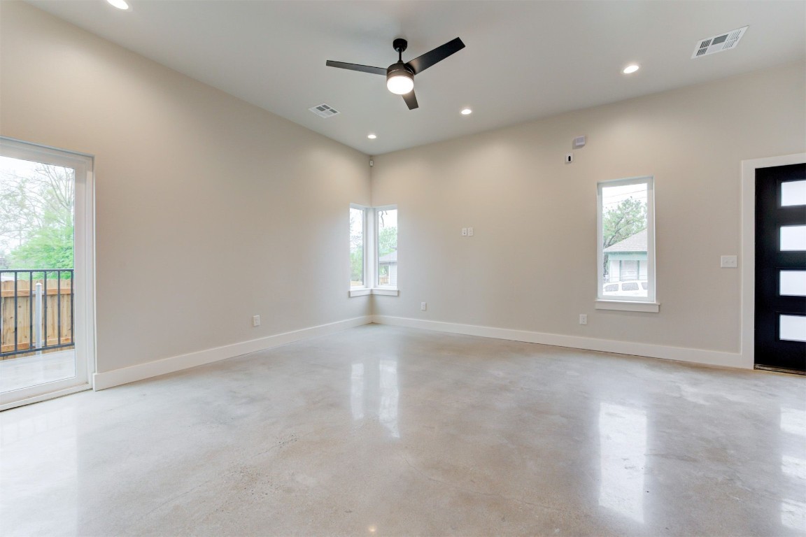 808 N Douglas Avenue, Oklahoma City, OK 73106 empty room with concrete flooring and ceiling fan