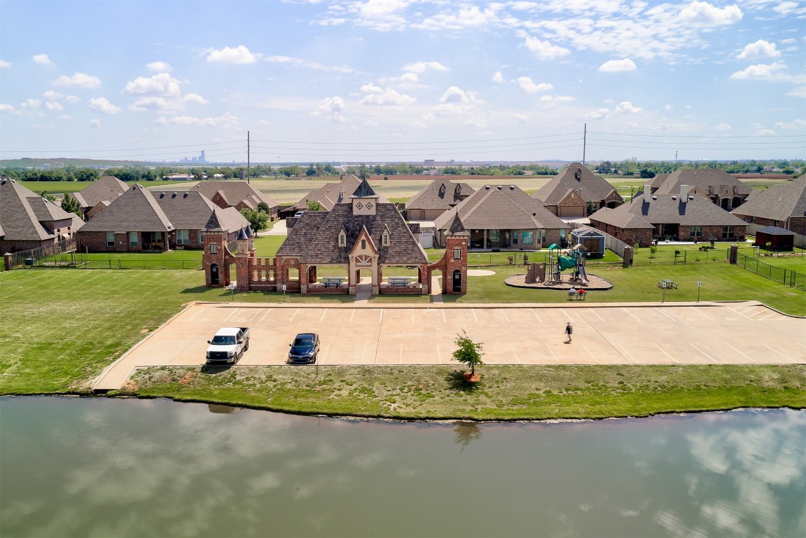 9204 SW 41st Street, Oklahoma City, OK 73179 drone / aerial view featuring a water view