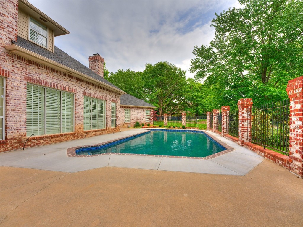 1307 Brookside Drive, Norman, OK 73072 view of swimming pool with a patio
