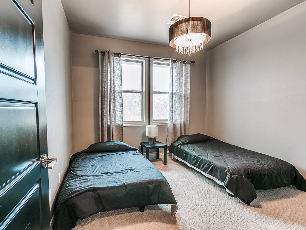 7208 NW 156th Street, Edmond, OK 73013 bedroom featuring carpet