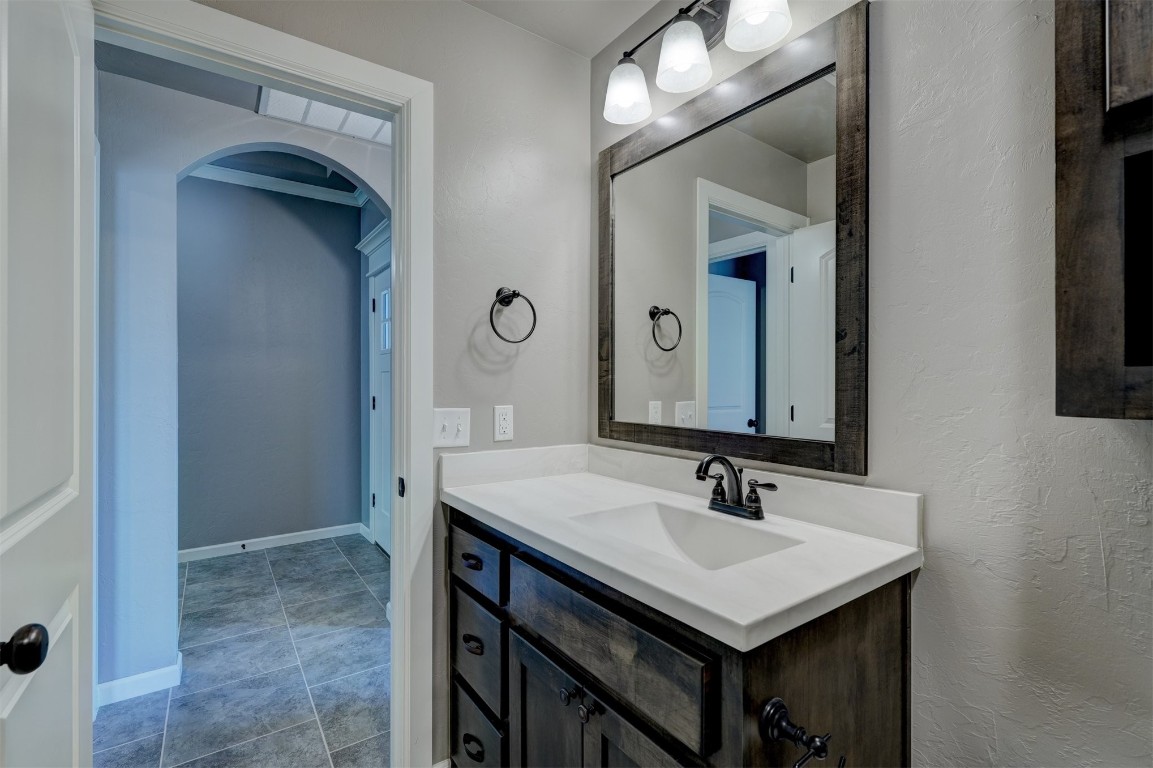 1727 W Blake Way, Mustang, OK 73064 bathroom featuring oversized vanity and tile flooring