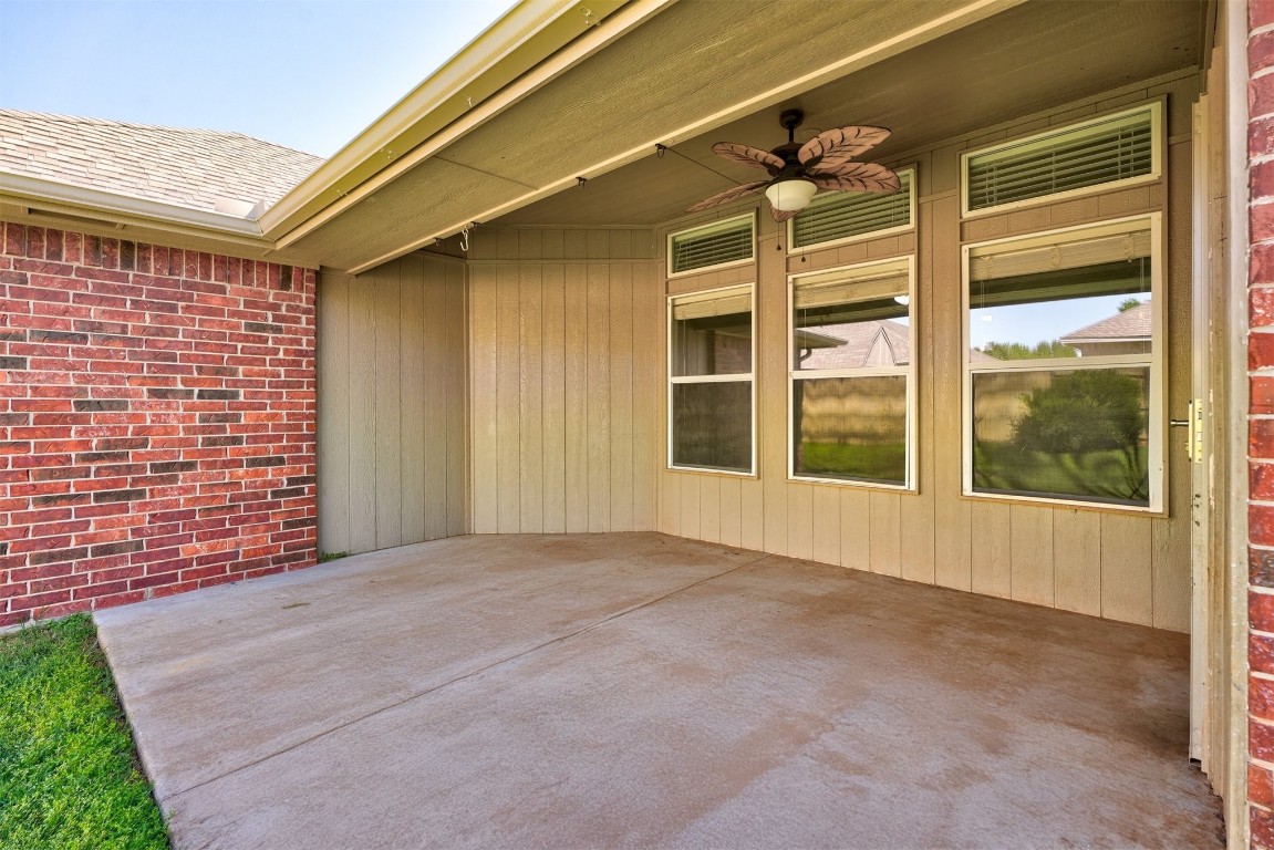 713 N Bobcat Way, Mustang, OK 73064 view of patio / terrace with ceiling fan
