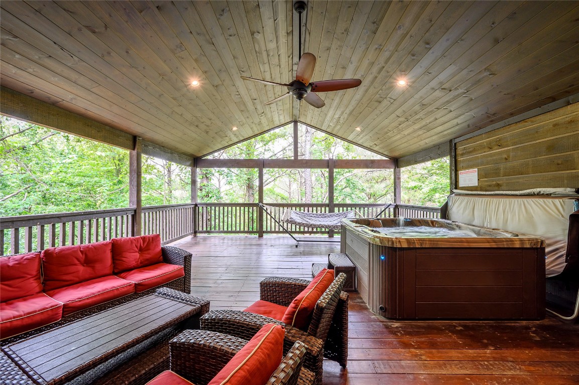 119 Ginseng Circle, Broken Bow, OK 74728 sunroom featuring wooden ceiling, plenty of natural light, ceiling fan, and vaulted ceiling