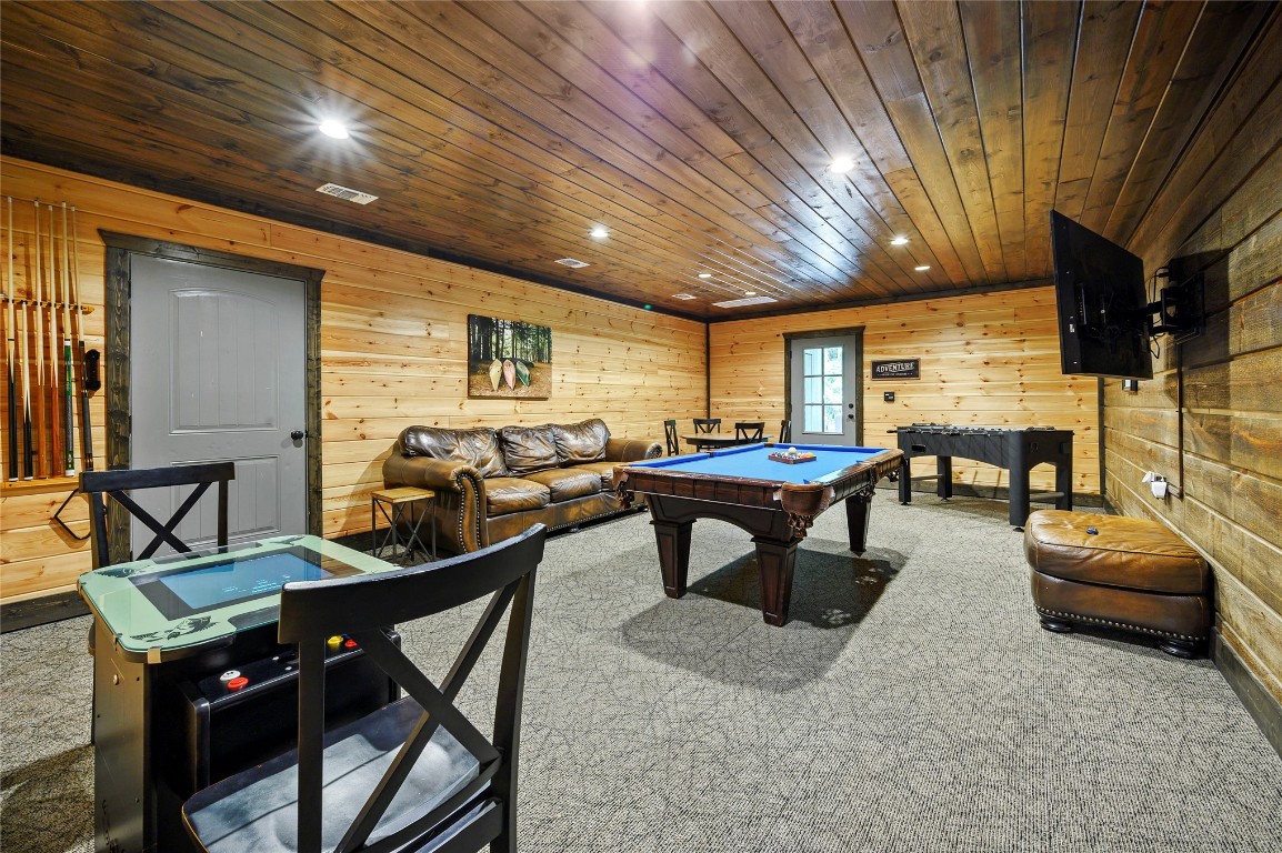 119 Ginseng Circle, Broken Bow, OK 74728 recreation room featuring wooden ceiling, wood walls, billiards, and carpet floors
