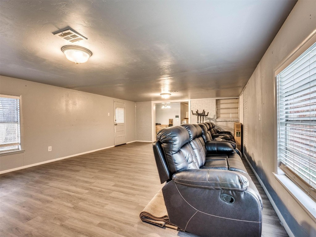 649 Juniper Avenue, Midwest City, OK 73130 living room with hardwood / wood-style floors