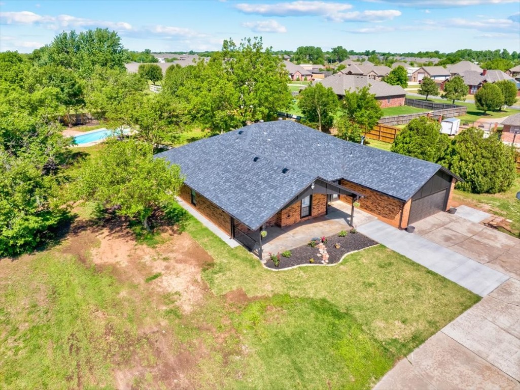 729 N Falcon Way, Mustang, OK 73064 view of drone / aerial view