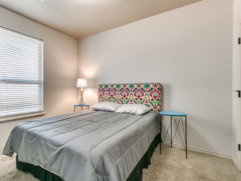 917 NW 195th Place, Edmond, OK 73012 bedroom featuring carpet flooring