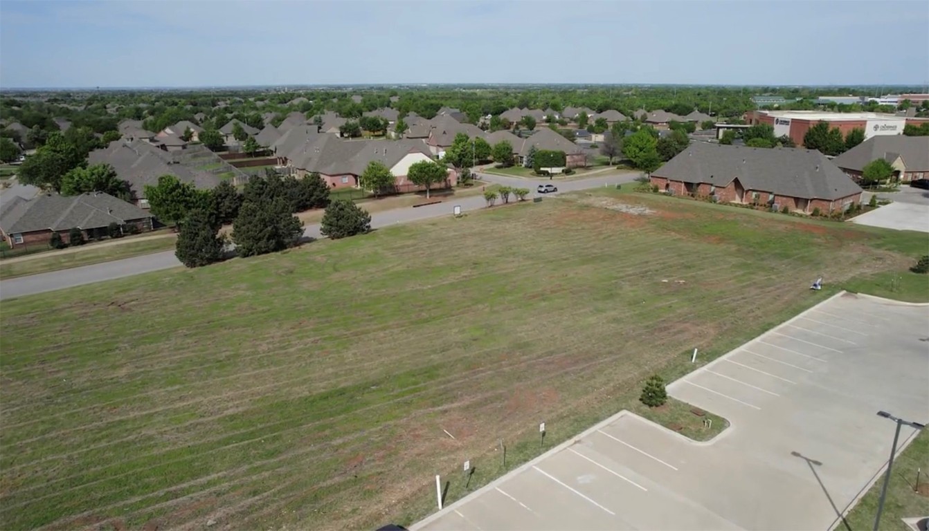 Covell Village Drive, Edmond, OK 73003 view of drone / aerial view