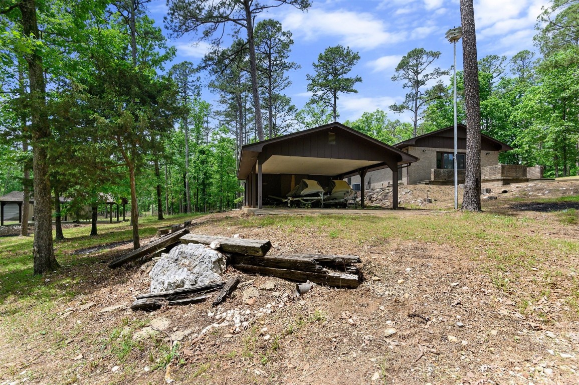 688 Old Hochatown Road, Broken Bow, OK 74728 view of yard with a carport