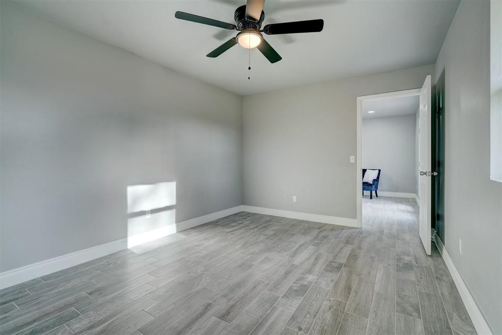 1500 SW 79th Terrace, Oklahoma City, OK 73159 spare room with ceiling fan and light hardwood / wood-style floors