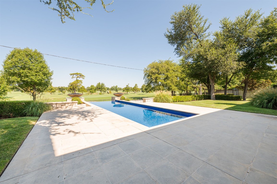 6510 N Hillcrest Avenue, Nichols Hills, OK 73116 view of pool with a lawn