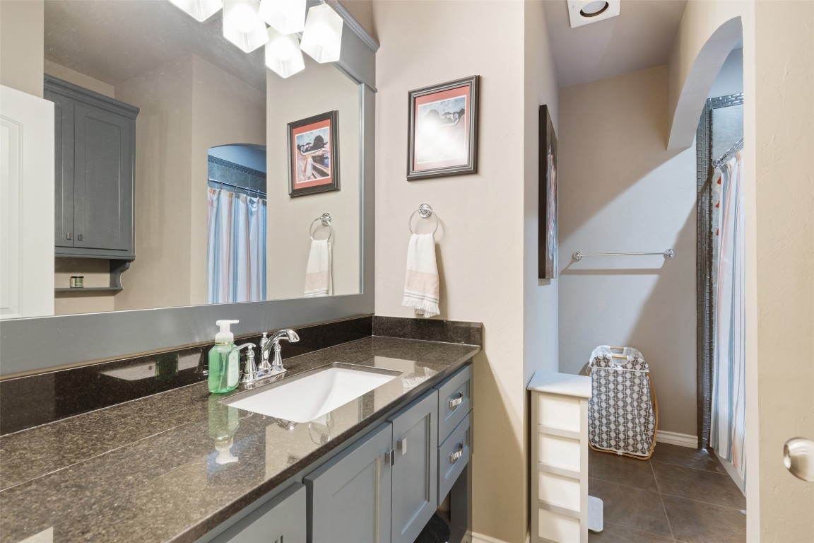 3501 Dornoch Drive, Edmond, OK 73034 bathroom featuring vanity and tile floors