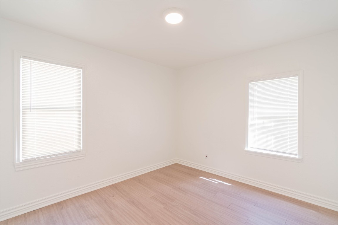 2420 SW 50th Street, Oklahoma City, OK 73119 empty room featuring light wood-type flooring