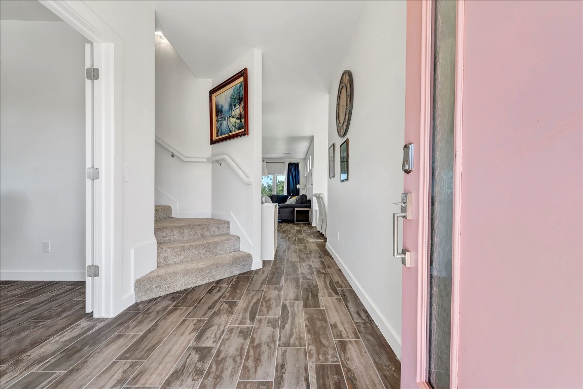 2140 Santa Monica Street, Edmond, OK 73034 entryway featuring hardwood / wood-style flooring