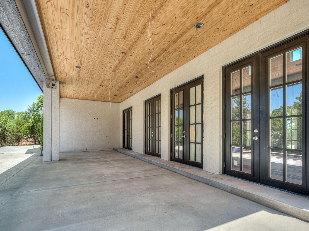 14101 Shoreline Boulevard, Oklahoma City, OK 73013 view of patio featuring french doors