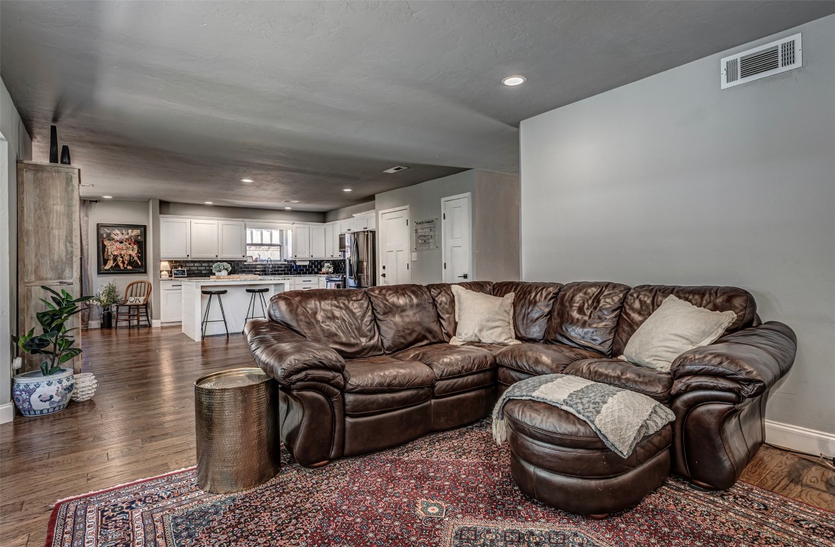 5213 N Miller Place, Oklahoma City, OK 73112 living room featuring dark hardwood / wood-style floors