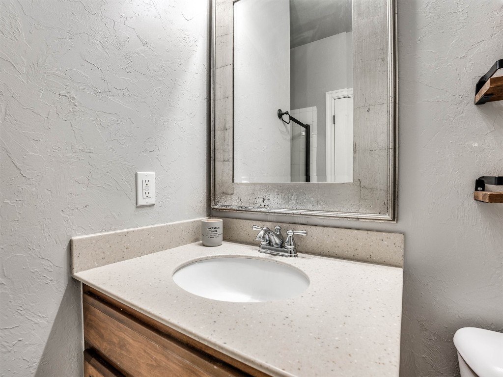 5112 SW 123rd Street, Oklahoma City, OK 73173 bathroom with oversized vanity and toilet