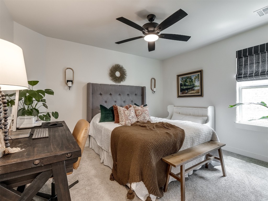 2300 El Cajon Street, Edmond, OK 73034 carpeted bedroom with ceiling fan