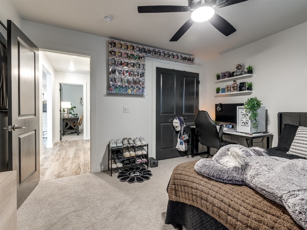 2300 El Cajon Street, Edmond, OK 73034 carpeted bedroom with ceiling fan