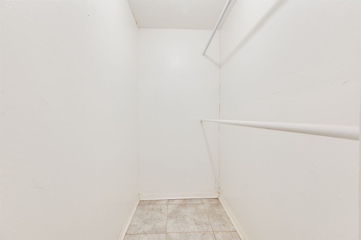 2616 NW 33rd Street, Oklahoma City, OK 73112 spacious closet featuring light tile floors
