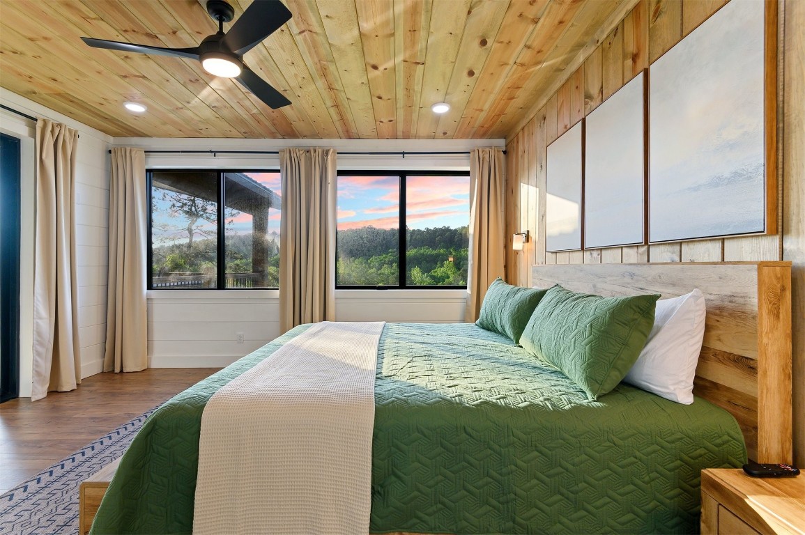 262 Forest Brook Loop, Broken Bow, OK 74728 bedroom featuring hardwood / wood-style flooring, wood ceiling, and ceiling fan