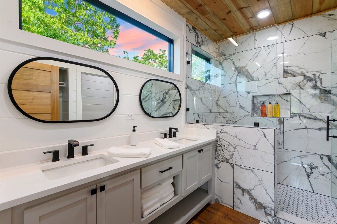 262 Forest Brook Loop, Broken Bow, OK 74728 bathroom with wooden ceiling, wood-type flooring, and double vanity