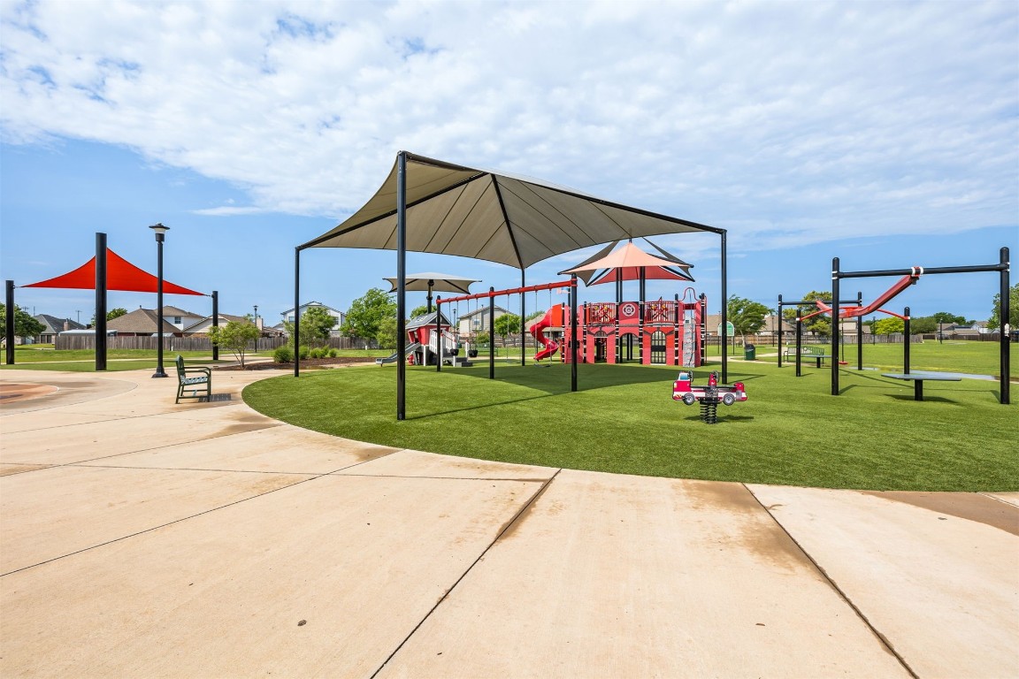 1007 SW 23rd Street, Moore, OK 73170 view of playground with a yard