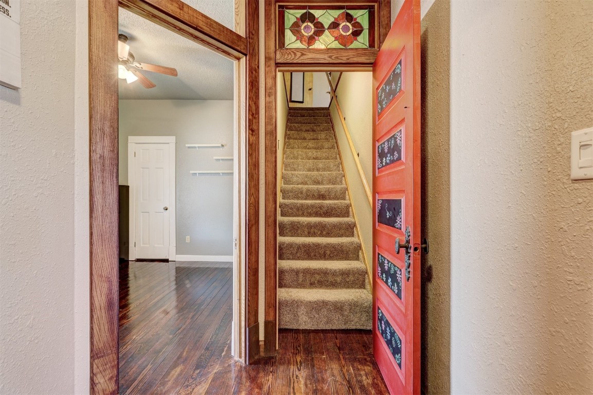 1008 Sunset Drive, El Reno, OK 73036 corridor with dark hardwood / wood-style flooring