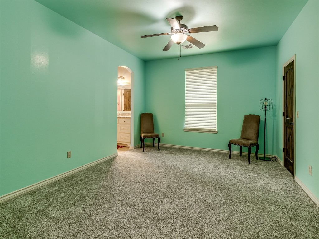 9612 SW 35th Street, Oklahoma City, OK 73179 unfurnished room featuring ceiling fan and carpet
