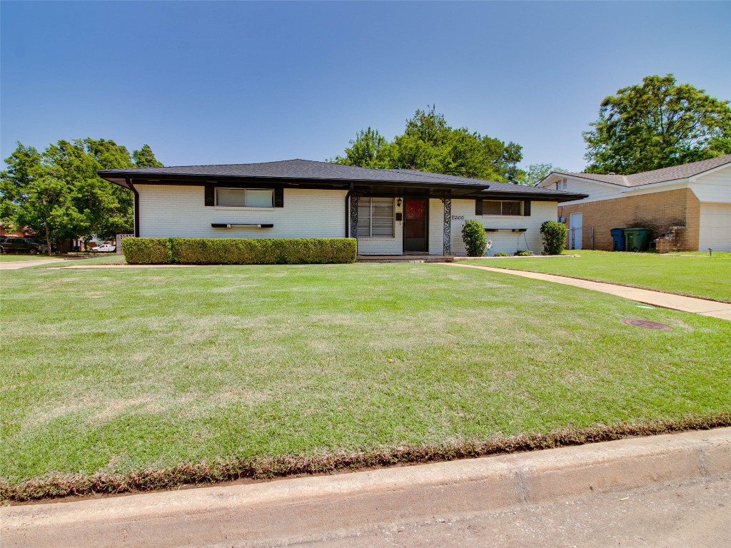 Check out this beautiful home in the heart of Edmond on a large corner lot.  Current homeowners painted the exterior a nice white brick with black trim.  Granite countertops in kitchen and main bathroom.  This well taken care of home has a massive living room with gas fireplace and built ins along with a secondary living area when you walk through the front door that could be used as a seating area, office or whatever you need it for.  Bedrooms are in great condition with the contemporary, retro parquet flooring with nice closets for lots of storage.  Come see this home and fall in love for your new home or a great investment property.