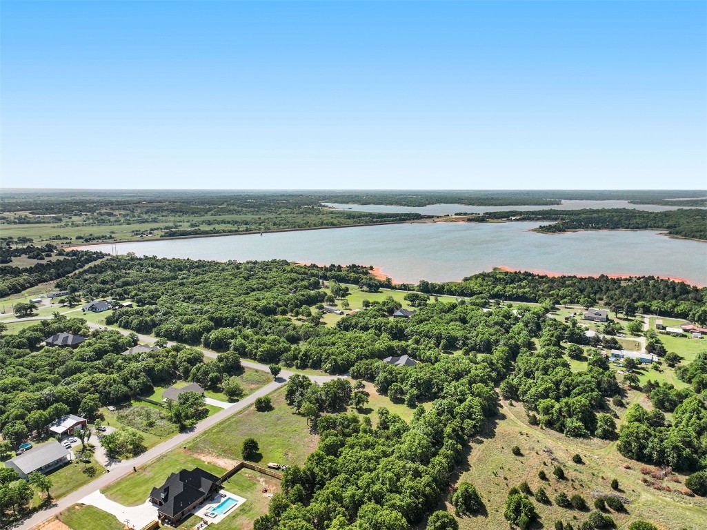 32704 Tincup Drive, Shawnee, OK 74804 aerial view featuring a water view