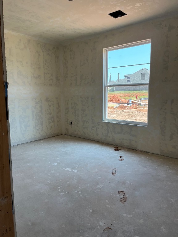 10305 Two Lakes Drive, Yukon, OK 73099 unfurnished room with concrete flooring