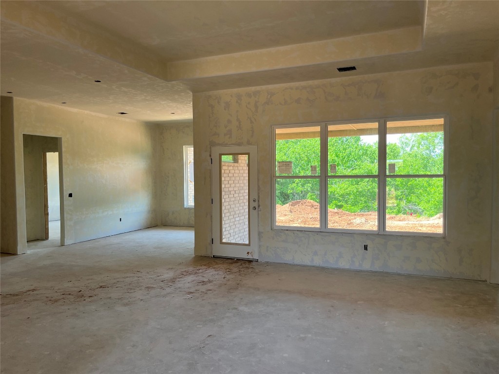 10305 Two Lakes Drive, Yukon, OK 73099 unfurnished room with concrete flooring