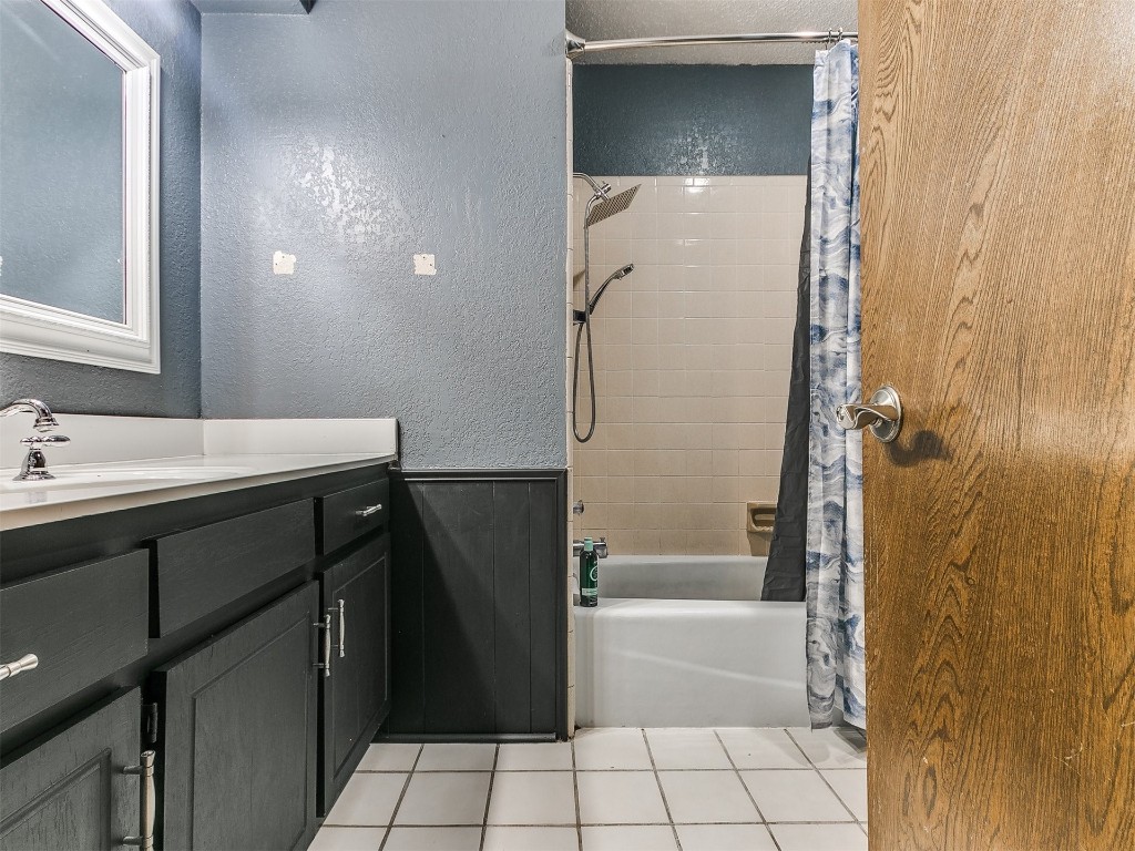 136 Sequoia Park Drive, Yukon, OK 73099 bathroom featuring shower / tub combo with curtain, vanity, and tile flooring