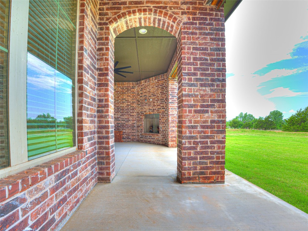 1391 S Kenzie Ct Drive, Mustang, OK 73064 view of patio featuring ceiling fan