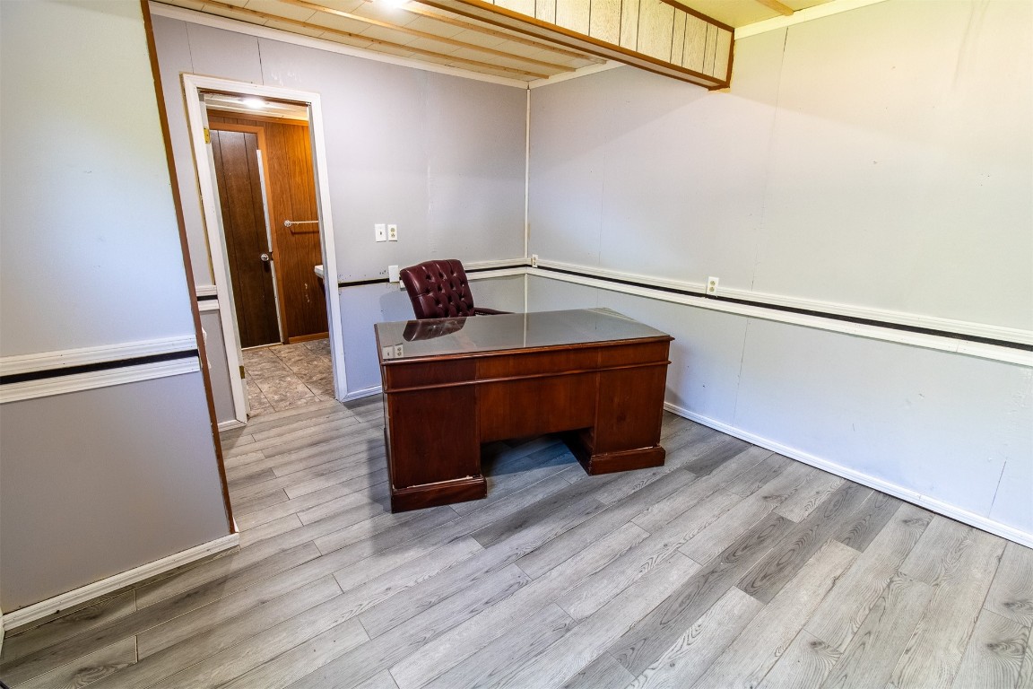119 W Tennyson Avenue, Tecumseh, OK 74873 unfurnished office with light wood-type flooring