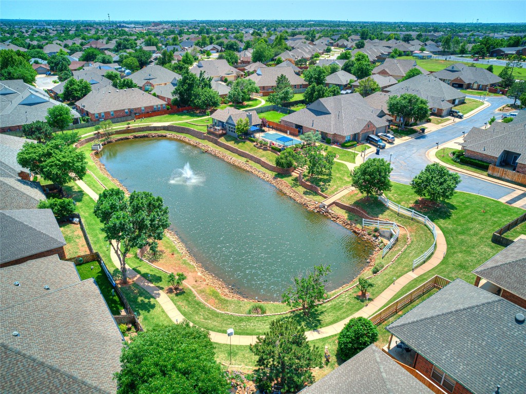 6913 NW 133rd Terrace, Oklahoma City, OK 73142 aerial view featuring a water view