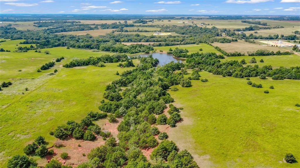 18633 N Santa Fe Avenue, Mulhall, OK 73063 drone / aerial view with a rural view and a water view