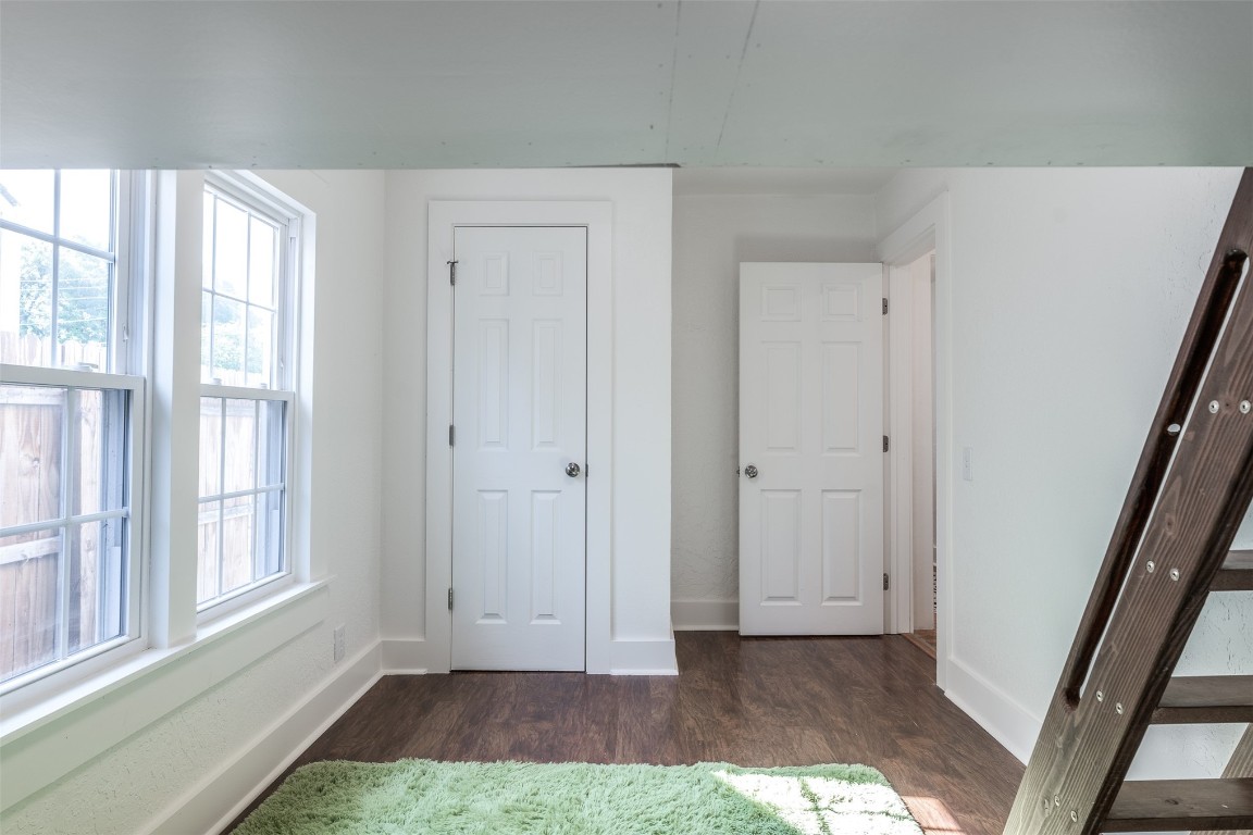 620 Nebraska Street, Norman, OK 73069 unfurnished bedroom with dark hardwood / wood-style floors